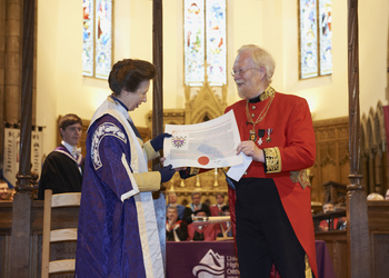 The Chancellor receiving the Letters Patent from the Lord Lyon