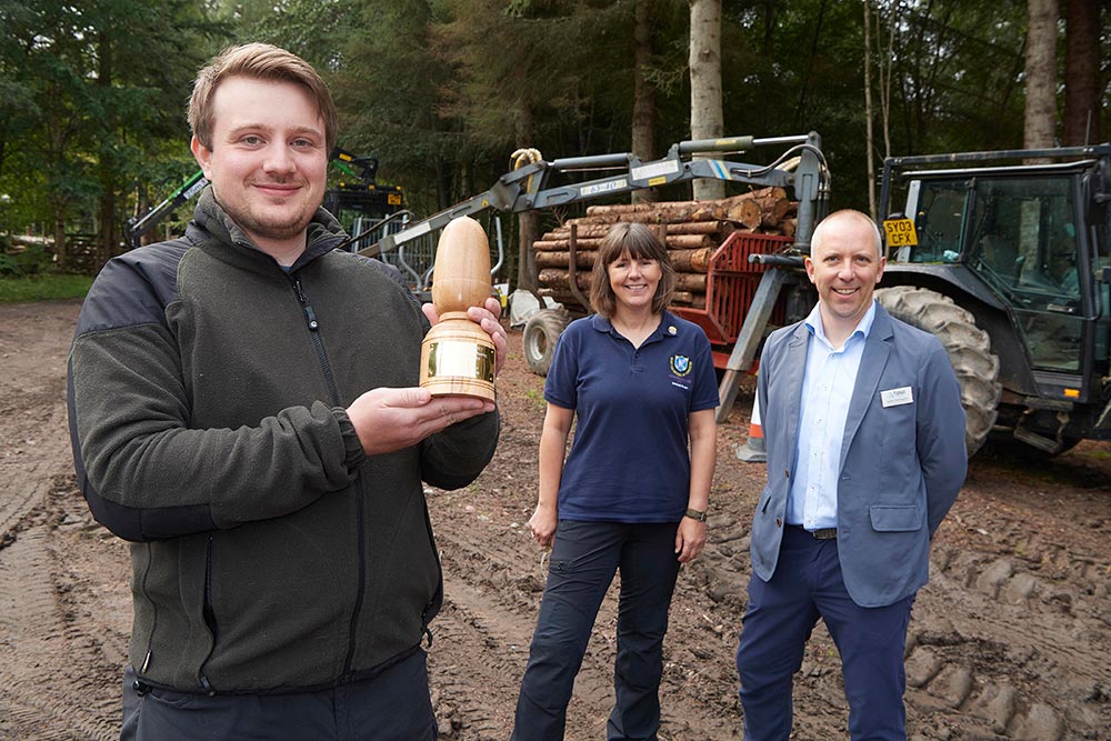 A student from the Scottish School of Forestry at Inverness College UHI won an award from Tilhill Forestry for a report on woodland creation.