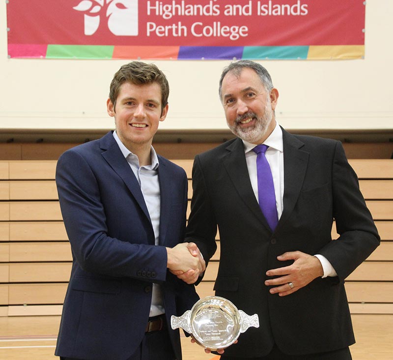 Squash player presented with university award 