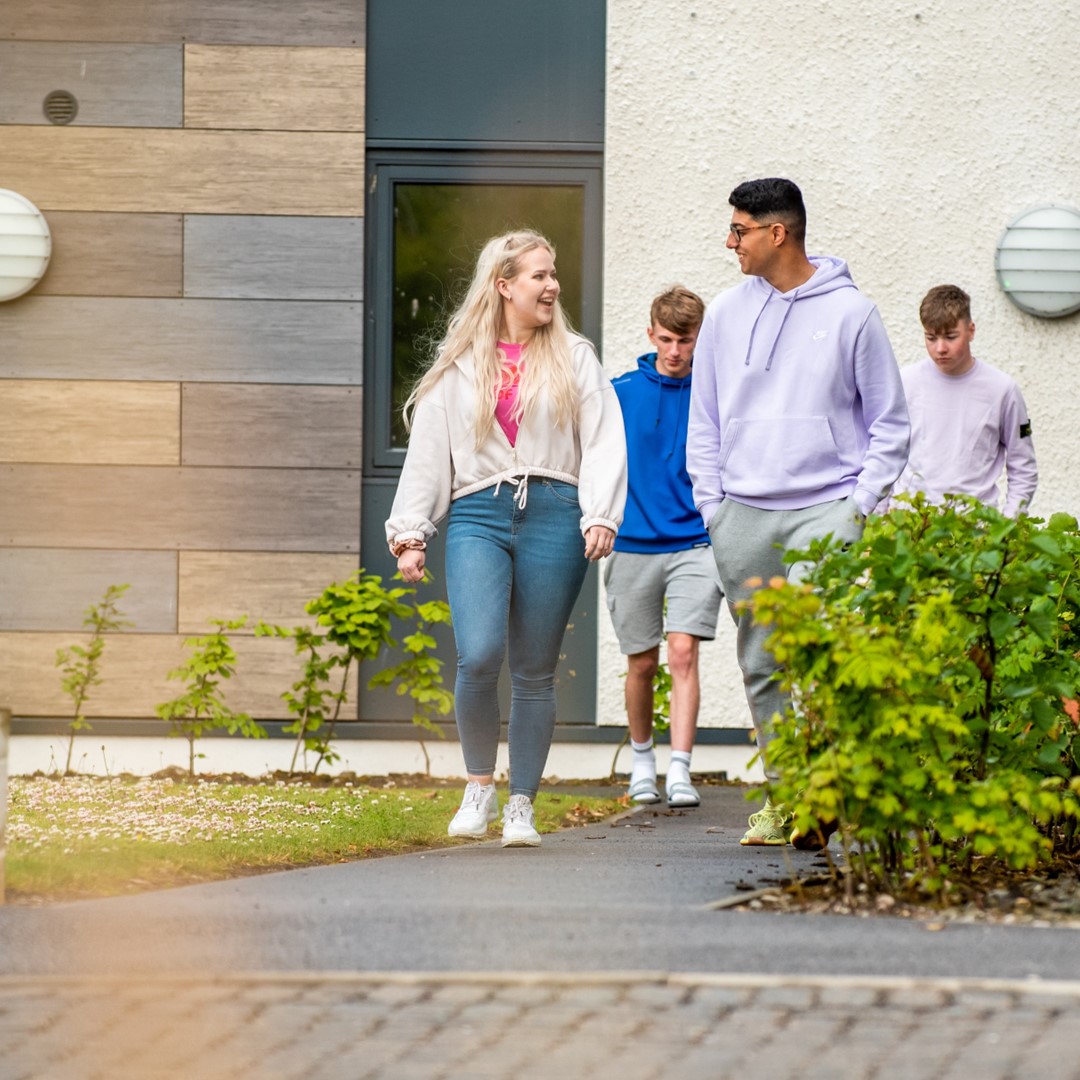 Group of people walking outside