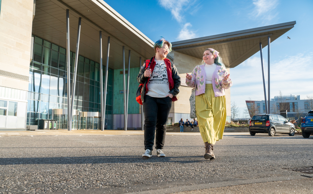 Students walking outside a campus