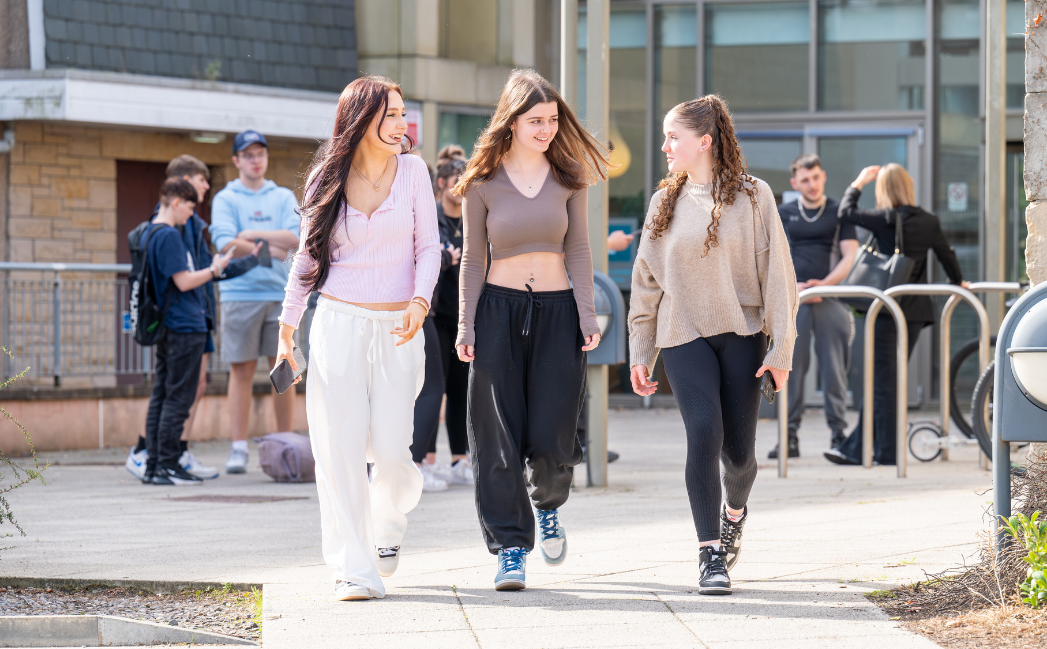 Students walking outside a campus