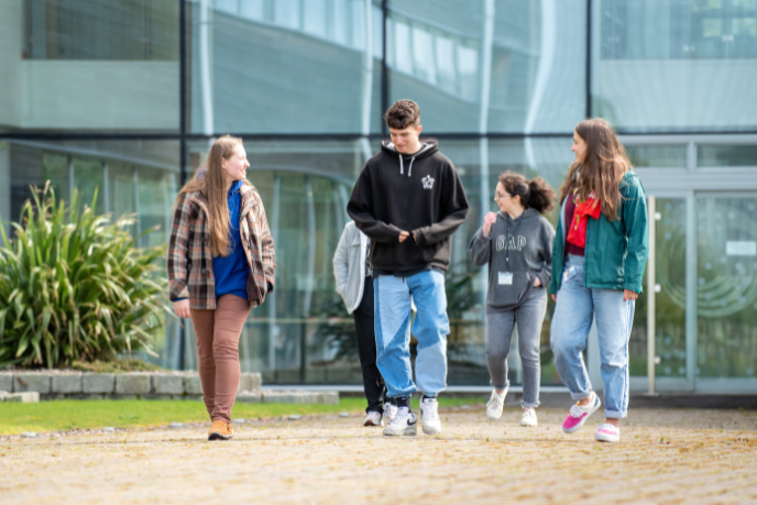 Students walking outside SAMS, a UHI campus